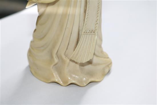 A Chinese ivory carving, late 19th century, He Xiang height 23cm